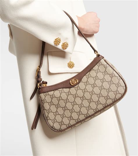 rolling gucci bag|Gucci ophidia shoulder bag small.